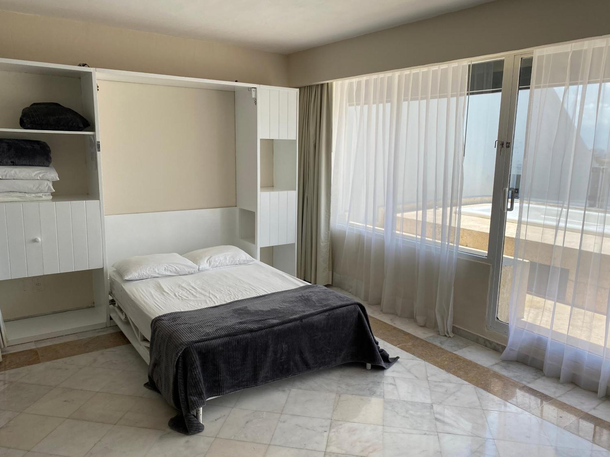 Condo In Ocean Front Resort Канкун Номер фото